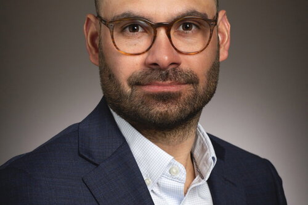 A photo of Dr. Jose Atiles looking at the camera.