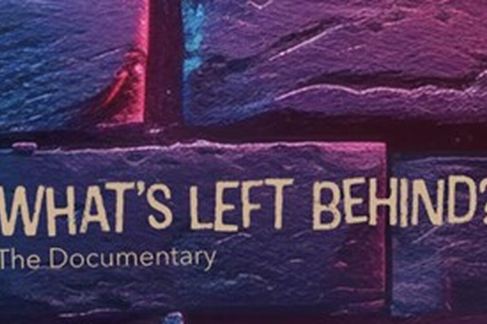 Promotional image for What's Left Behind? The Documentary. Film title is overlaid over a close-up of a brick wall lit with red and blue light.
